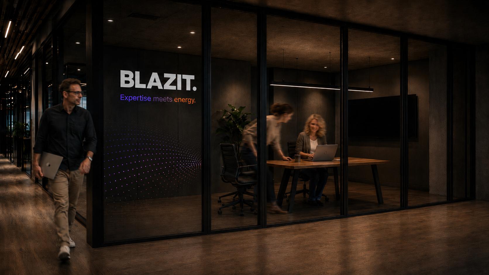 Blazit Marketing Team Workspace — warm Boston office with plants, soft lighting, and team members collaborating